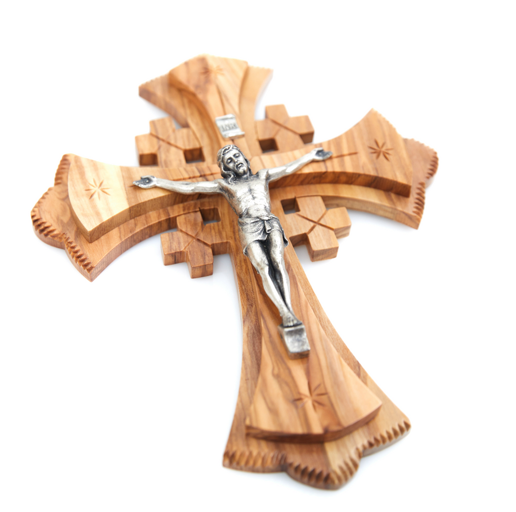 Olive wood crucifix hand carved in Bethlehem, 8.7 inch three quarter view of the religious piece