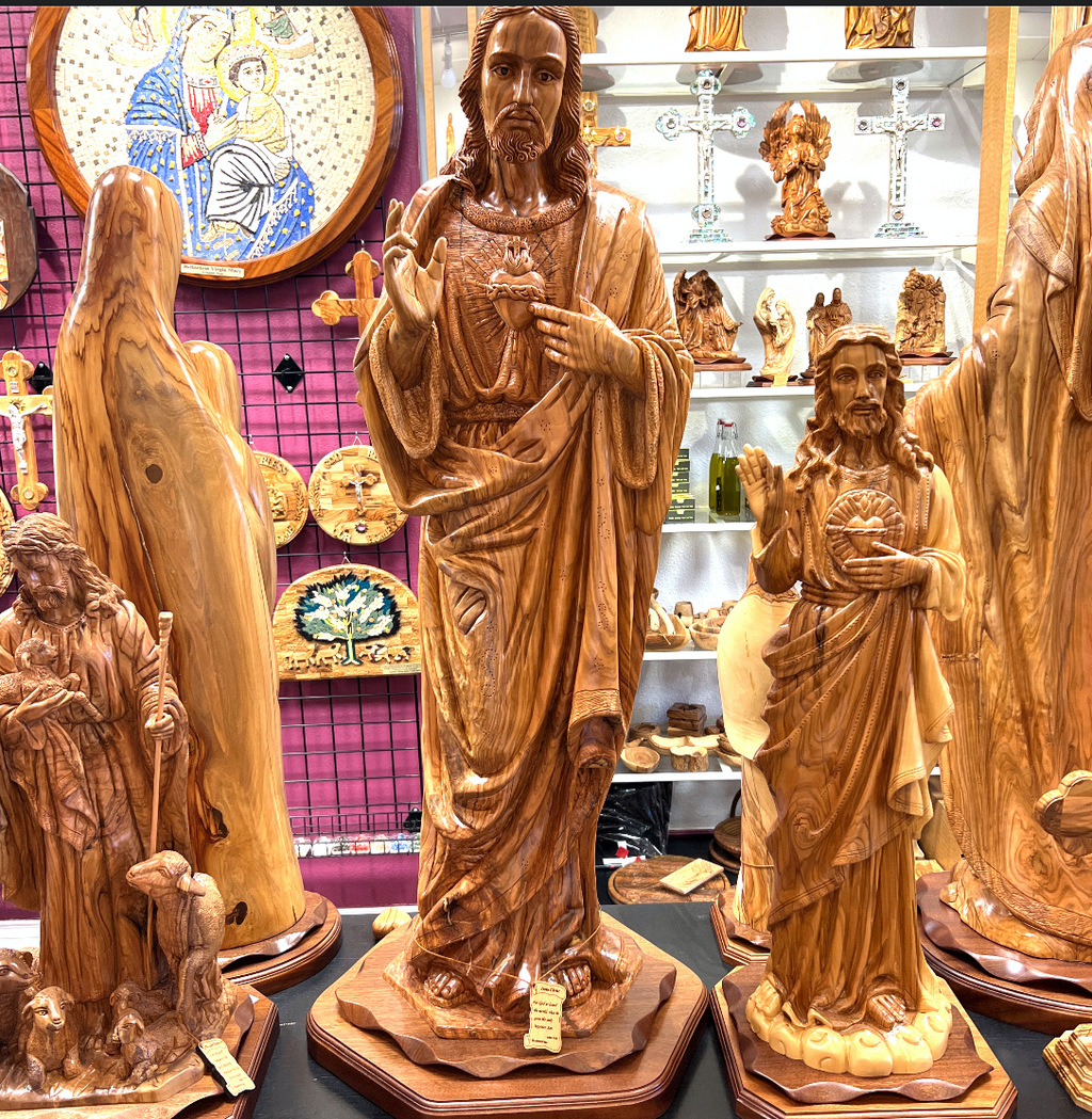Jesus Christ statue hand carved from Bethlehem olive wood, front view of the olive wood masterpiece