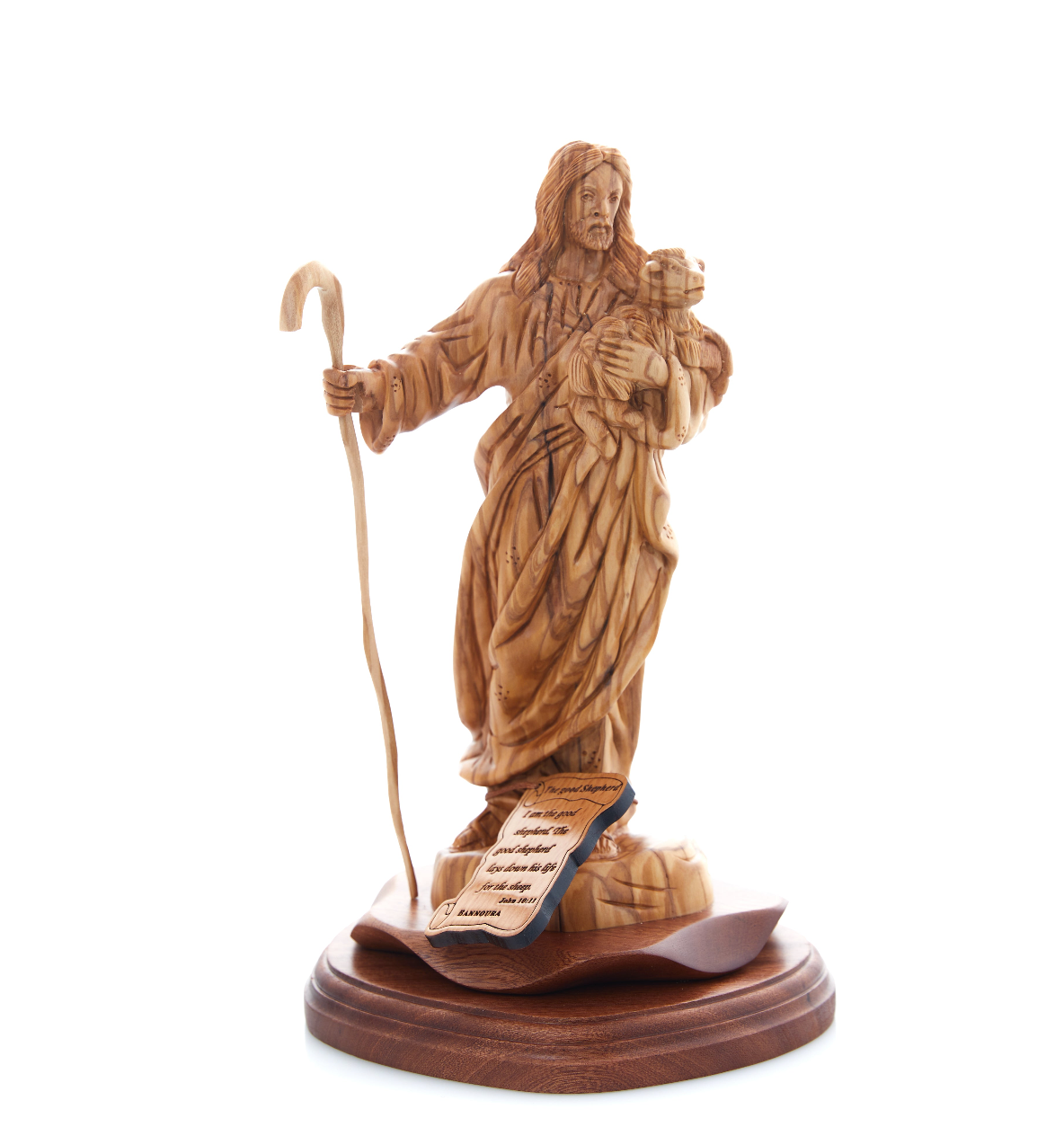 Carved wooden statue of Jesus Christ, 'The Good Shepherd', holding a sheep on his shoulders, standing upright on a base.