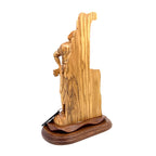 Jesus Christ statue hand carved from Bethlehem olive wood, three quarter view of the religious piece