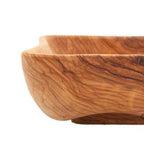Olive wood tableware hand made in Bethlehem, detail of the carved figure