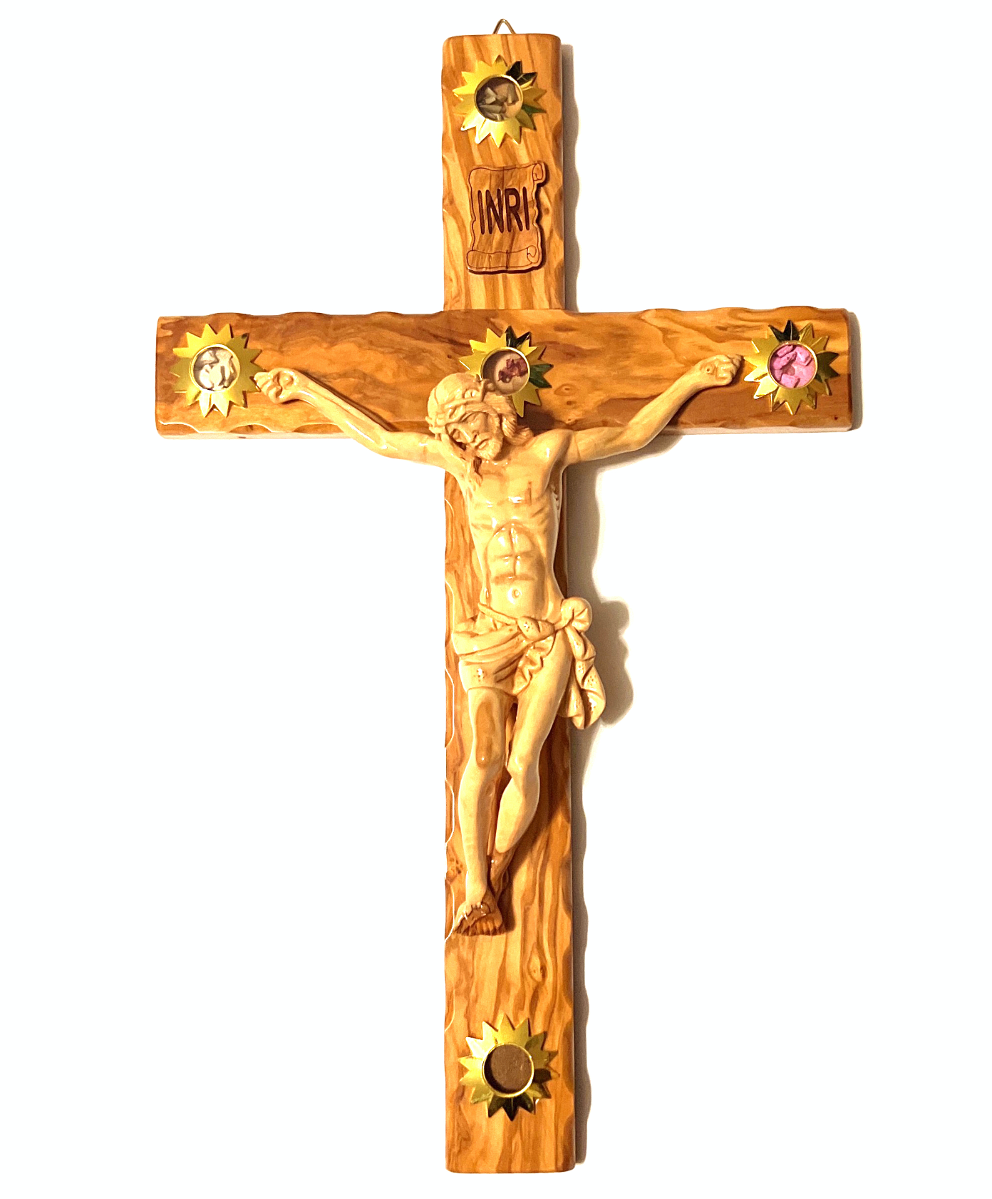 A 19 inch olive wood hand-carved crucifix with five glass capsules attached to it, featuring various souvenirs from the Holy Land.