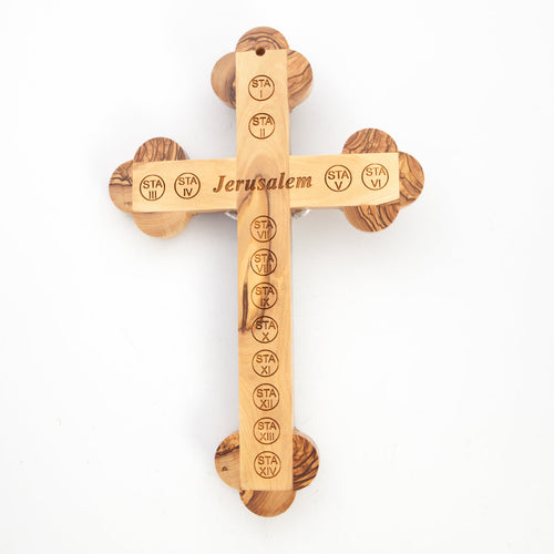 Olive wood crucifix hand carved in Bethlehem, 5.5 inch side angle of the olive wood sculpture