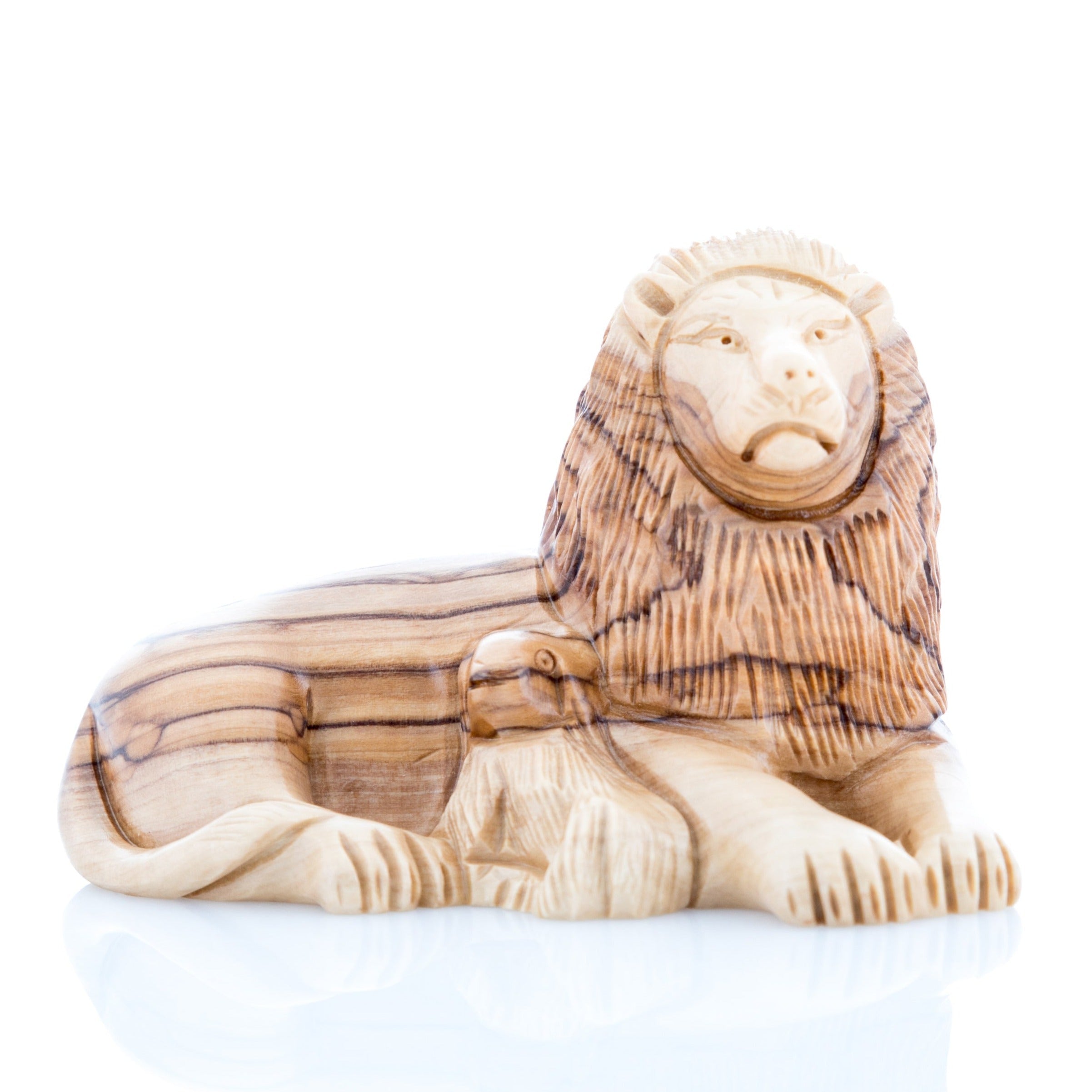 A wooden sculpture of a lion with a lamb next to it, carved in olive wood.
