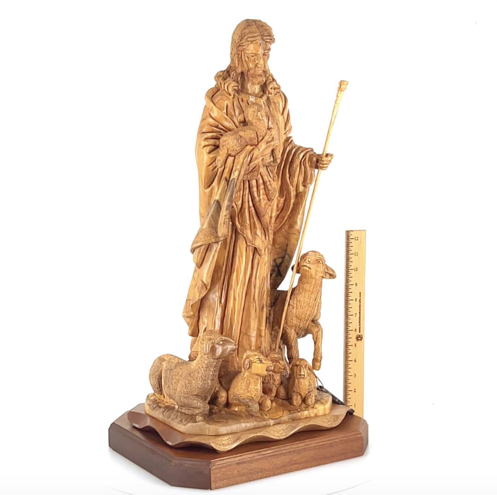 Good Shepherd statue hand carved from Bethlehem olive wood, 26 inch three quarter view of the religious piece