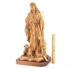 Good Shepherd statue hand carved from Bethlehem olive wood, 26 inch lifestyle photo on display