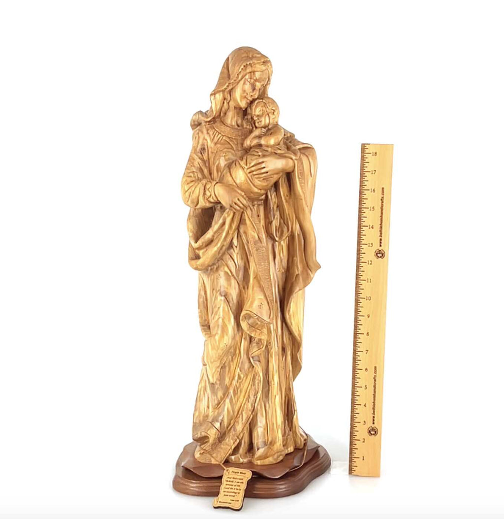 Jesus Christ statue hand carved from Bethlehem olive wood, 24 inch lifestyle photo on display