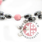 Olive wood rosary hand made in Bethlehem Holy Land, three quarter view of the religious piece