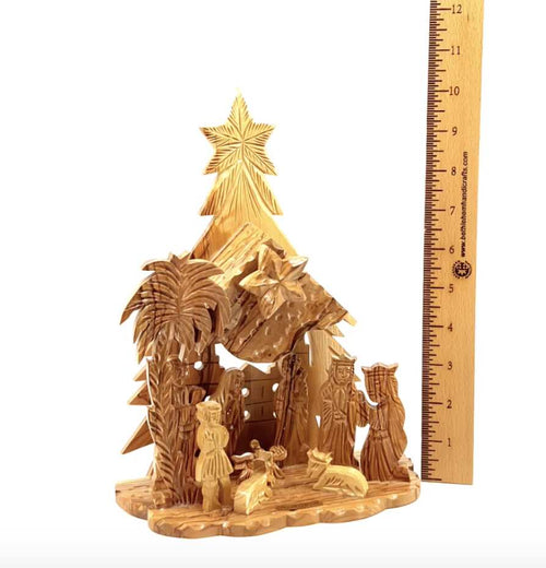 Olive wood nativity scene hand carved in Bethlehem, 10.4 inch side angle of the olive wood sculpture