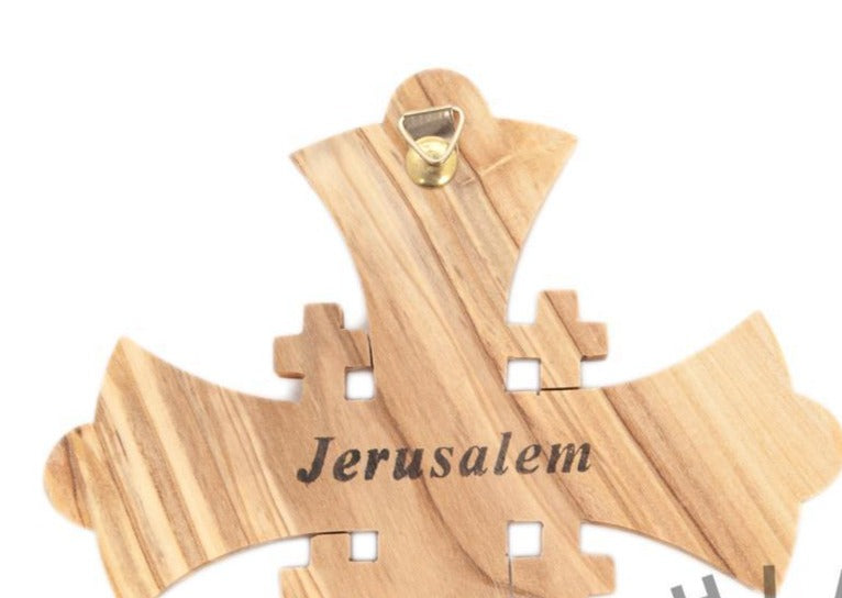 Olive wood wall cross hand carved in Bethlehem, 6.5 inch side angle of the olive wood sculpture