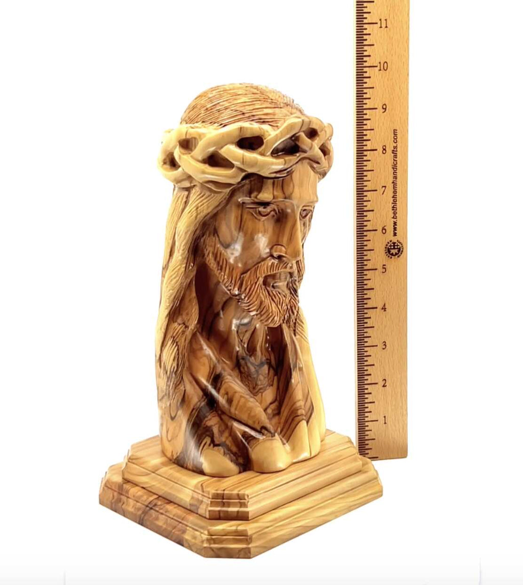 Jesus Christ statue hand carved from Bethlehem olive wood, 9.8 inch three quarter view of the religious piece