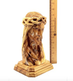 Jesus Christ statue hand carved from Bethlehem olive wood, 9.8 inch three quarter view of the religious piece