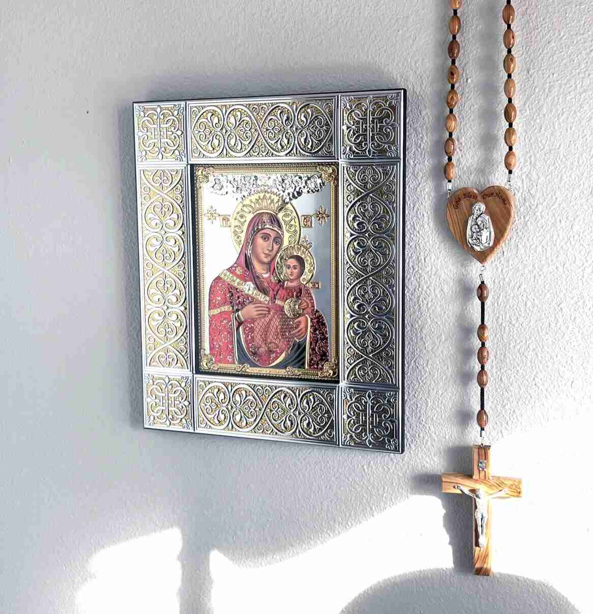 Virgin Mary Christian icon hand made in Bethlehem, front view of the silver masterpiece