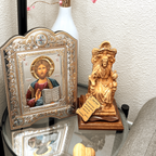 Jesus Christ statue hand carved from Bethlehem olive wood, 9.75 inch three quarter view of the religious piece
