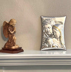 Holy Family Christian icon hand made in Bethlehem, side angle of the silver sculpture