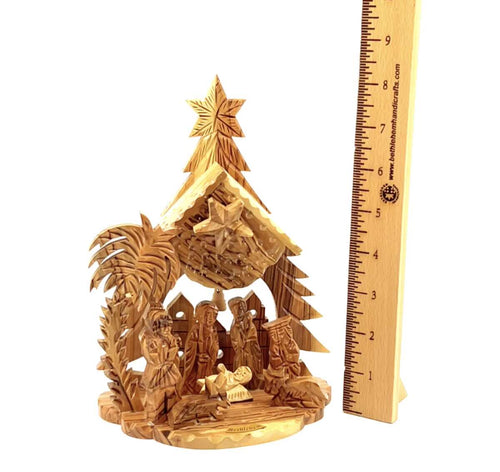 Olive wood nativity scene hand carved in Bethlehem, 8.5 inch side angle of the olive wood sculpture