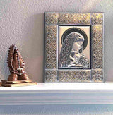 Icono de la Virgen María con el Niño Jesús, chapado en plata, con marco plateado y dorado