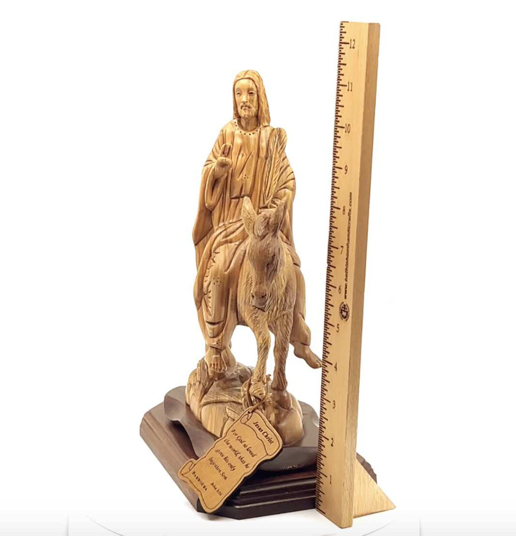 Jesus Christ statue hand carved from Bethlehem olive wood, 11.2 inch three quarter view of the religious piece