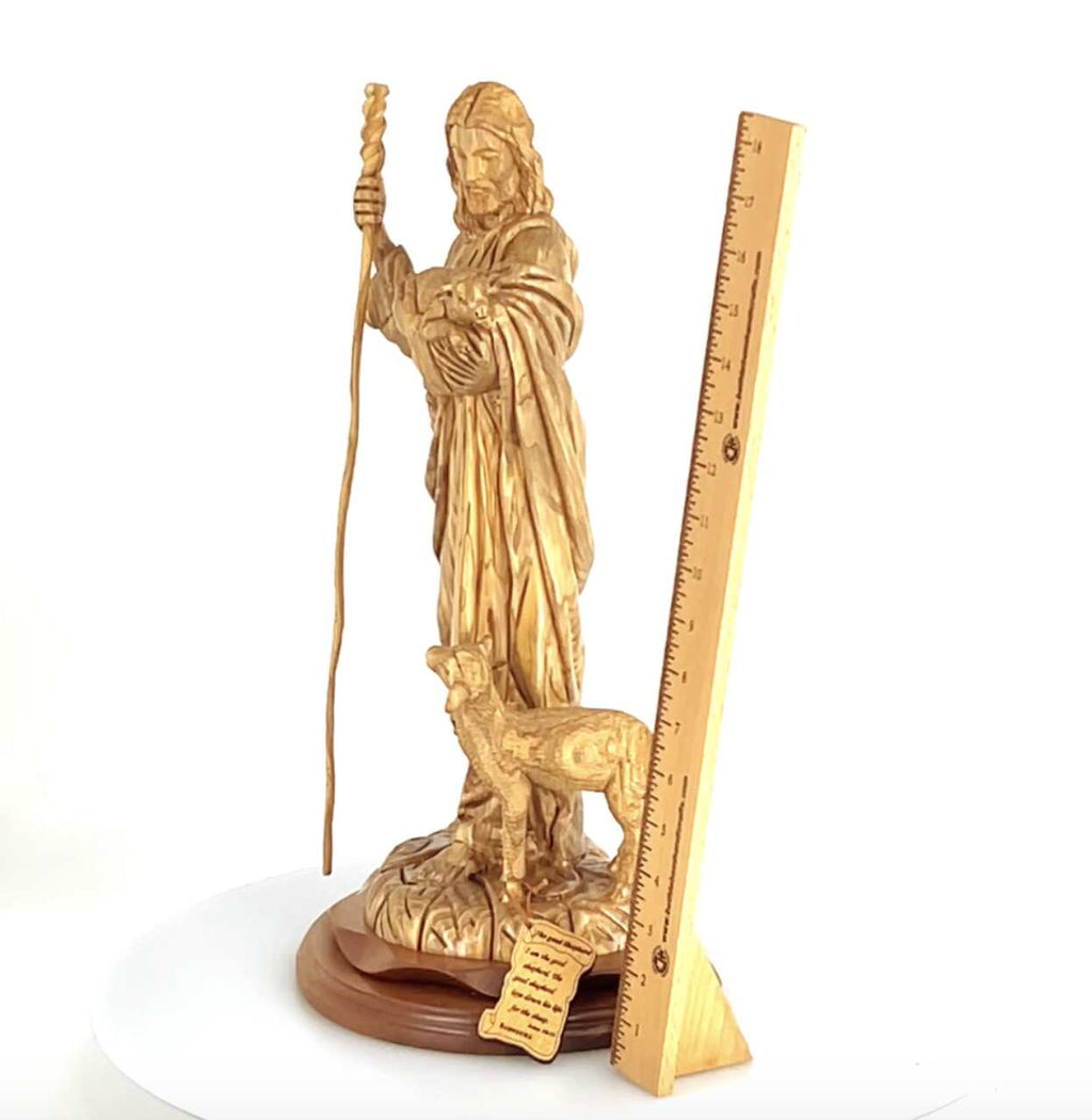 Good Shepherd statue hand carved from Bethlehem olive wood, 18.5 inch three quarter view of the religious piece