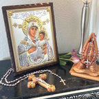 Virgin Mary Christian icon hand made in Bethlehem, front view of the silver masterpiece