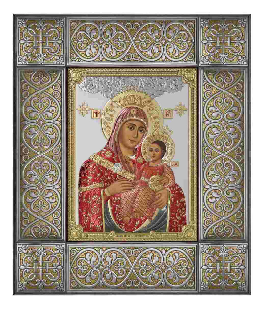 Virgin Mary Christian icon hand made in Bethlehem, side angle of the silver sculpture