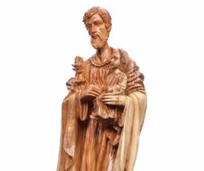 Jesus Christ statue hand carved from Bethlehem olive wood, 25.6 inch lifestyle photo on display