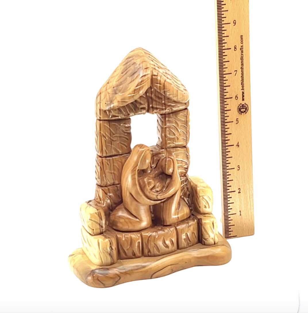 Olive wood nativity scene hand carved in Bethlehem, 8.5 inch side angle of the olive wood sculpture
