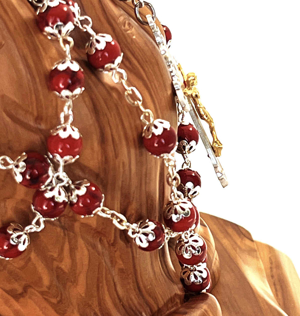 Olive wood rosary hand made in Bethlehem Holy Land, 22.4 inch lifestyle photo on display
