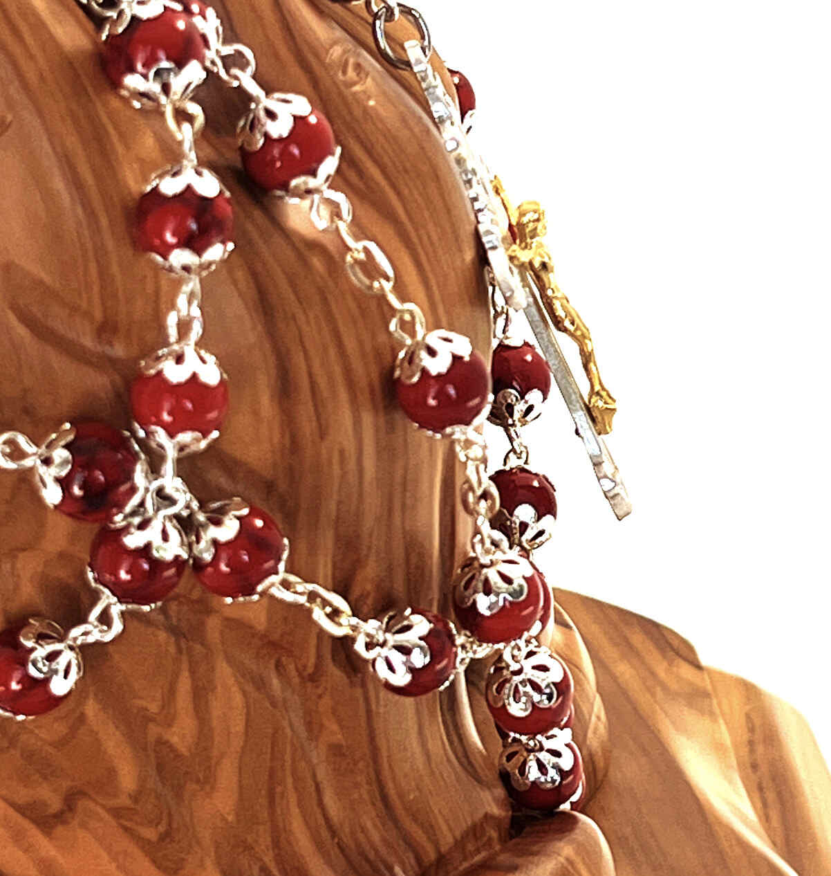 Olive wood rosary hand made in Bethlehem Holy Land, 22.4 inch lifestyle photo on display