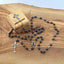 Rosary with Black Oval Stone Beads, Made in Bethlehem