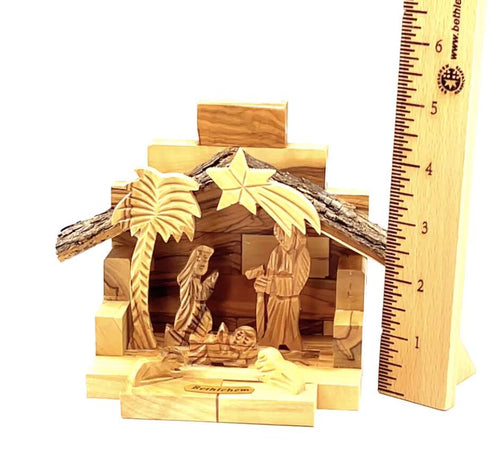 Olive wood nativity scene hand carved in Bethlehem, 4.5 inch side angle of the olive wood sculpture