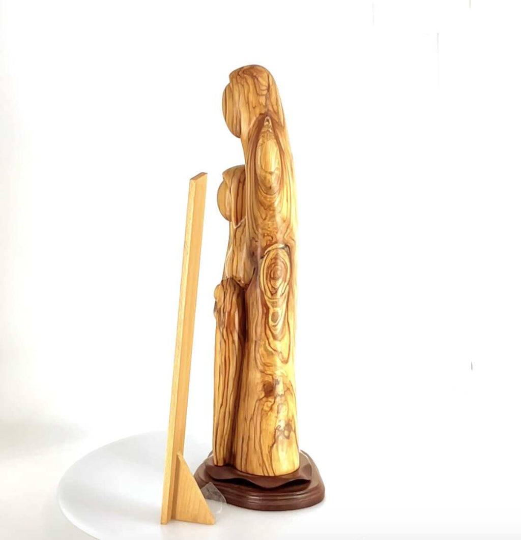 Olive wood nativity scene hand carved in Bethlehem, 23.3 inch three quarter view of the religious piece