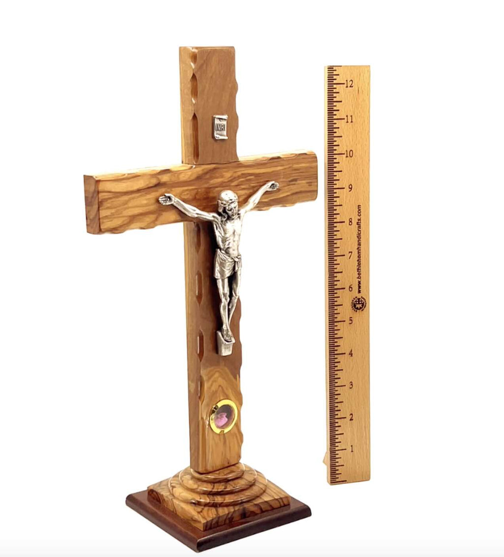 Olive wood crucifix hand carved in Bethlehem, 13 inch side angle of the olive wood sculpture