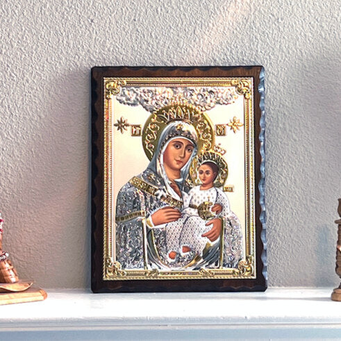 Virgin Mary Christian icon hand made in Bethlehem, close detail of the hand carved work