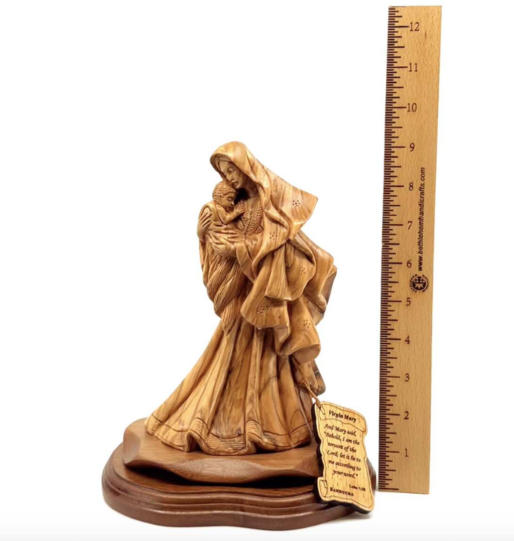 Virgin Mary olive wood statue from Bethlehem hand carved, 10 inch side angle of the olive wood sculpture
