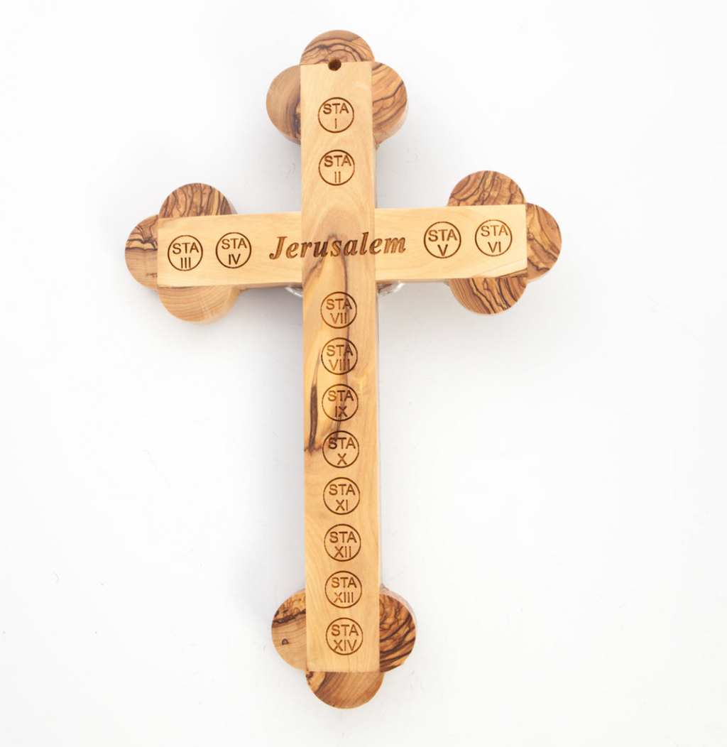 Olive wood crucifix hand carved in Bethlehem, 7 inch three quarter view of the religious piece