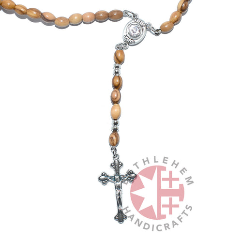 Olive wood rosary hand made in Bethlehem Holy Land, front view of the olive wood masterpiece