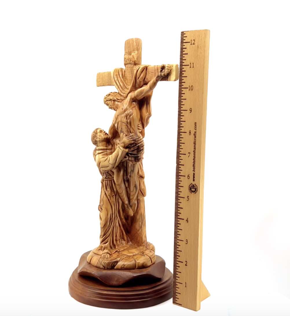 Jesus Christ olive wood wall cross from Bethlehem, 13.2 inch three quarter view of the religious piece