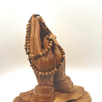 Olive wood crucifix hand carved in Bethlehem, back view of the olive wood sculpture